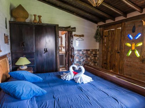Una cama o camas en una habitación de Zaysant Ecolodge