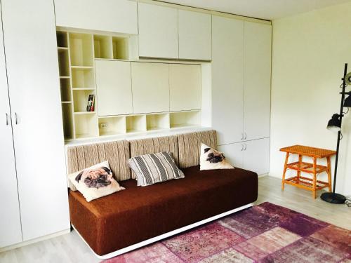 A seating area at Modern Studio 20 Meters from Mladost 1 Metro Station