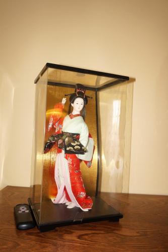a picture of a woman in a glass box at Inn on the Harbour in Charlottetown