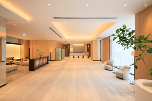 an empty lobby of a hospital with a waiting room at Richmond Hotel Himeji in Himeji