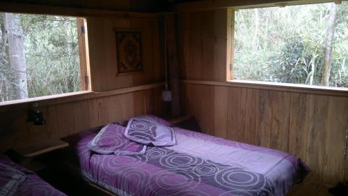 Llit o llits en una habitació de Rumi Wilco Ecolodge & Nature Reserve-Cabañas & Camping
