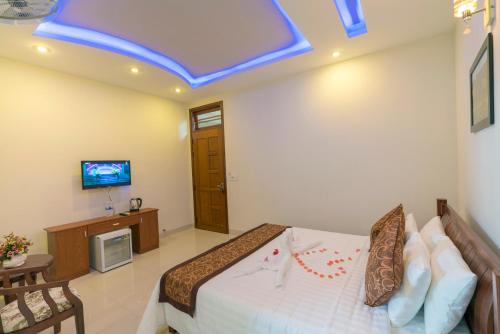 Кровать или кровати в номере My House Hoi An Homestay