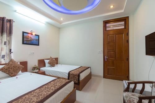Кровать или кровати в номере My House Hoi An Homestay