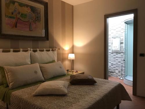LE FORRI Agriturismo e B&Bにあるベッド