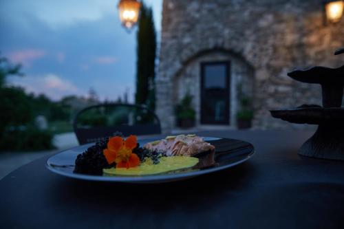 a plate of food sitting on top of a table at Le Pré de l'Aube in Montjoyer