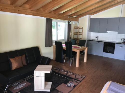 Kuchyň nebo kuchyňský kout v ubytování Aladin Apartments St Moritz