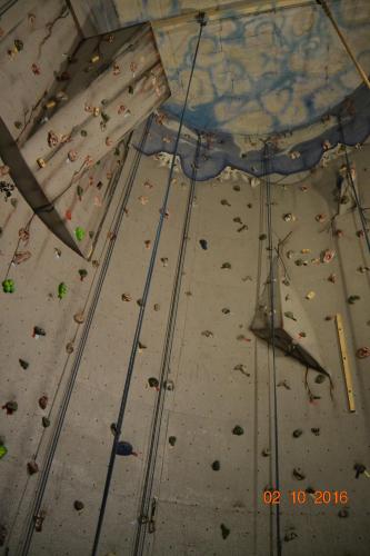 an indoor climbing wall with rocks on it at Fossanmoen in Forsand