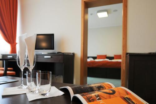 TV a/nebo společenská místnost v ubytování Hotel SOREA REGIA