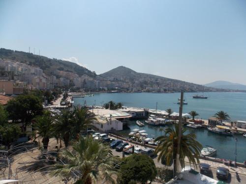 a view of a harbor with boats in the water at Hotel Real in Sarandë