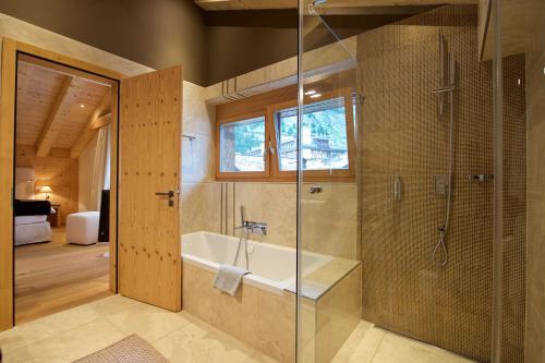 Ένα μπάνιο στο Matterhorn Lodge Boutique Hotel & Apartments