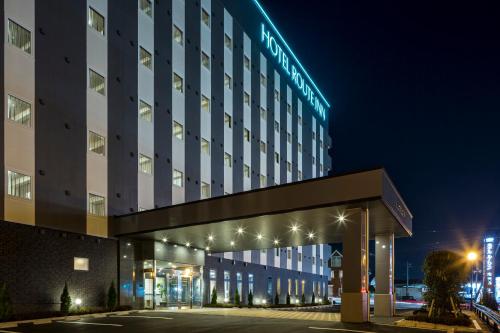 eine Darstellung eines Hotels in der Nacht in der Unterkunft Hotel Route-Inn Kisarazu in Kisarazu