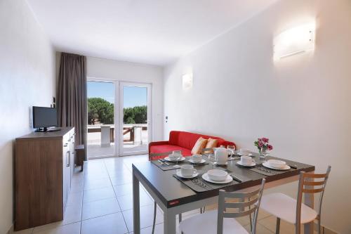 Televisyen dan/atau pusat hiburan di Diano Sporting Apartments