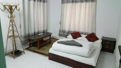 Cama o camas de una habitación en BnB Royal Tourist House