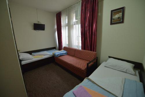 Кровать или кровати в номере Guesthouse Duga