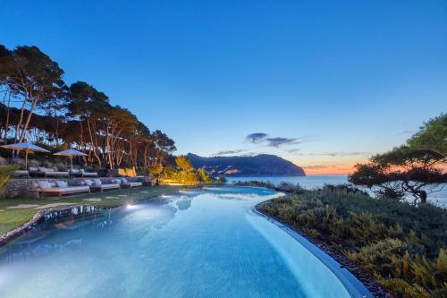 a large body of water with a view of a beach at Pleta de Mar, Luxury Hotel by Nature - Adults Only in Canyamel