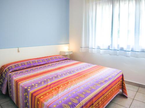 Postel nebo postele na pokoji v ubytování Appartamenti Bella Venezia