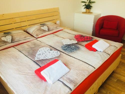Un ou plusieurs lits dans un hébergement de l'établissement Apartmany a Ubytovani Mlynice Litovel