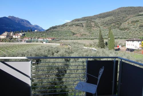 a balcony with a view of a mountain at Ecohotel Primavera in Riva del Garda