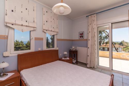 Postel nebo postele na pokoji v ubytování Kyrana Apartments