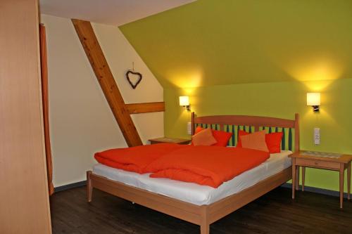 Postel nebo postele na pokoji v ubytování Elgersheimer Hof