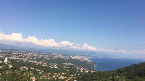 an aerial view of a city and the ocean at Apartment Gina in Opatija