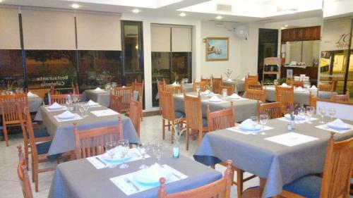 ห้องอาหารหรือที่รับประทานอาหารของ Hotel Escala Uno