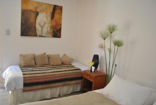 Una cama o camas en una habitación de Hotel Boutique Molzano