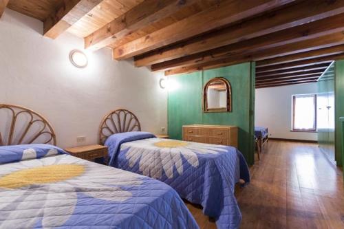 Giường trong phòng chung tại Antica Tonnara Porto Paglia