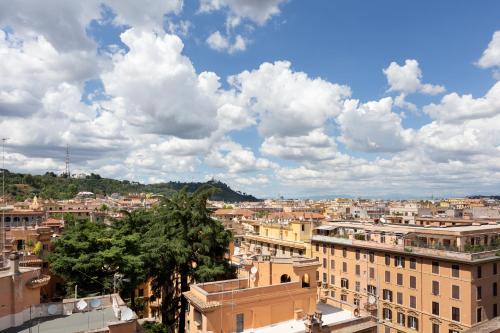 a view of a city under a cloudy sky at Lilli Vatican White Domus in Rome