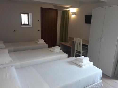 Cama o camas de una habitación en Albergo Diffuso Belvedere