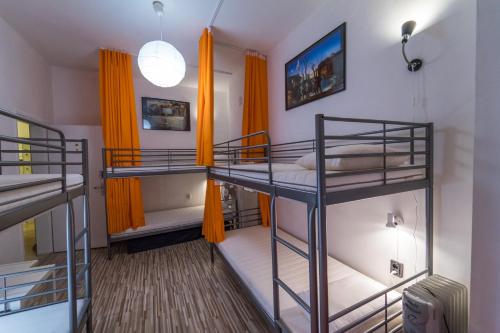 Postel nebo postele na pokoji v ubytování Pijama Hostel
