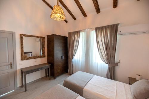 Ένα ή περισσότερα κρεβάτια σε δωμάτιο στο Z Exclusive Hotel and Villas