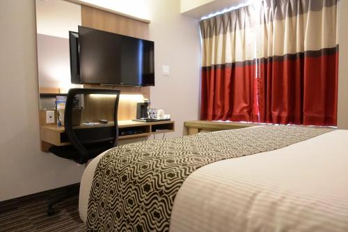 Ein Bett oder Betten in einem Zimmer der Unterkunft Microtel Casselman