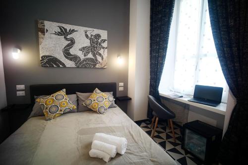 Postel nebo postele na pokoji v ubytování Roma Centrale Fidelis