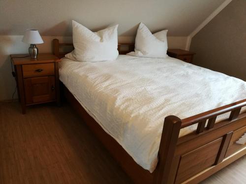 Ένα ή περισσότερα κρεβάτια σε δωμάτιο στο Ferienhaus Ossi