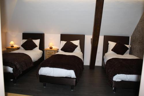 Postel nebo postele na pokoji v ubytování Hotel de la Gare