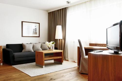 TV a/nebo společenská místnost v ubytování Hotel La Majun