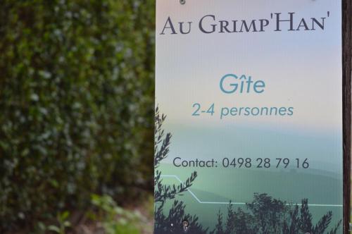 a sign for a gimpharma ham at a park at Au Grimp'Han in Han-sur-Lesse