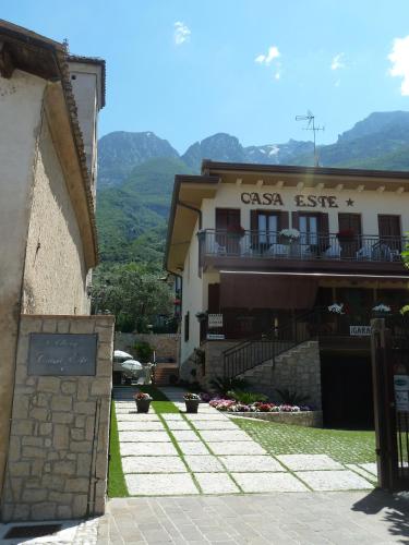 a building with a balcony on the side of it at Albergo Casa Este in Brenzone sul Garda
