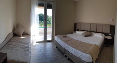 Letto o letti in una camera di Menta e Rosmarino Rooms