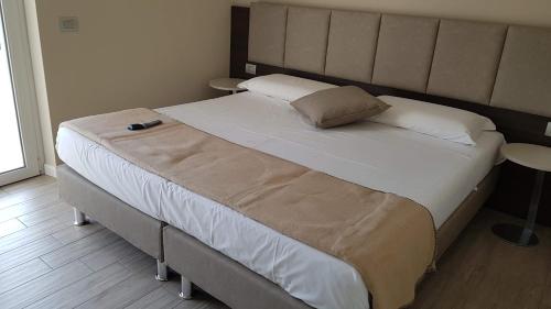 Letto o letti in una camera di Menta e Rosmarino Rooms