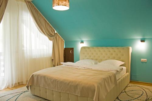 Кровать или кровати в номере I Love Bran House