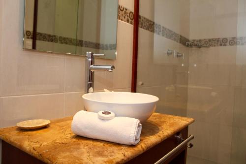Ett badrum på Casa de la iaia Hotel