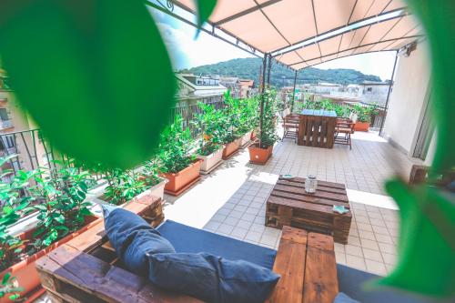 a view of a balcony with a table and chairs at Il Viaggiatore Serapo in Gaeta