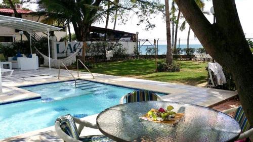 A piscina localizada em Caribbean Venture Cabaña Tropical - Pozos Colorados, Santa Marta ou nos arredores