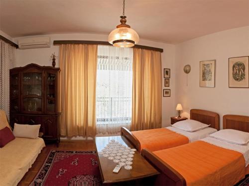 Postel nebo postele na pokoji v ubytování Apartments-Curkovic