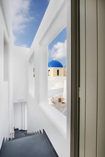 Nectarios Villa - Studios & Suites Adults Onlyにあるベッド