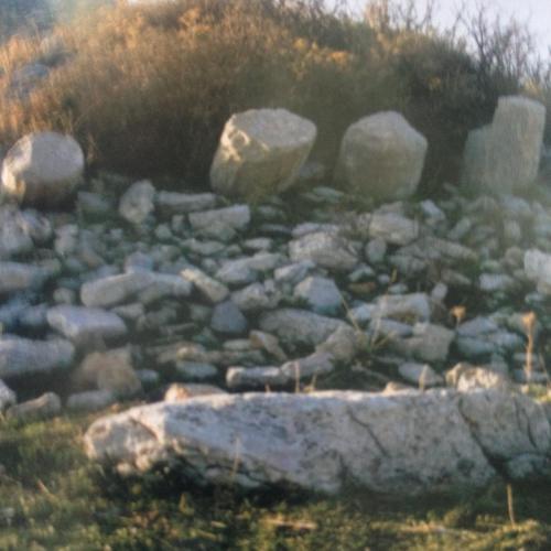 a pile of rocks on top of a hill at Gourgiana Apartments in Andritsaina