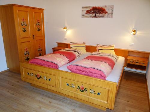 Postel nebo postele na pokoji v ubytování Hochwieserhof