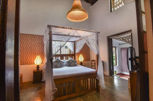 Een bed of bedden in een kamer bij Ceylon Boutique Homestay Kandy